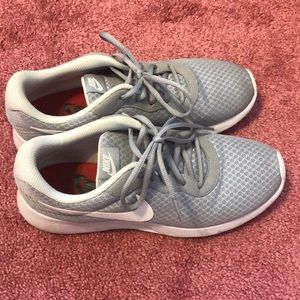 Nike sneakers, not worn much. Grey with white